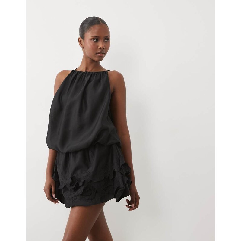 ASOS DESIGN halter mini dress with applique flower hem in black