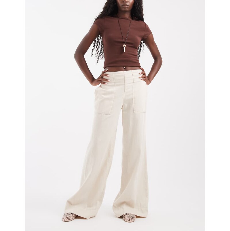 Free People breezy low rise flare pull on trouser in ivory-White