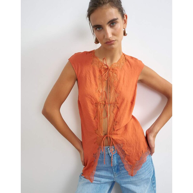 Topshop cap sleeve asymmetric tie front lace detail top in rust