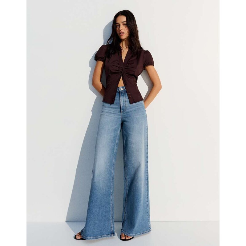 Bershka High-waist wide-leg jeans in mid blue