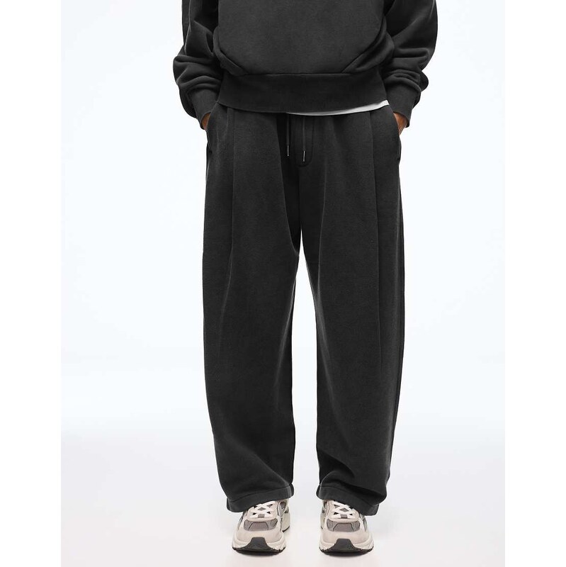 Bershka Balloon fit washed joggers with pleats in black