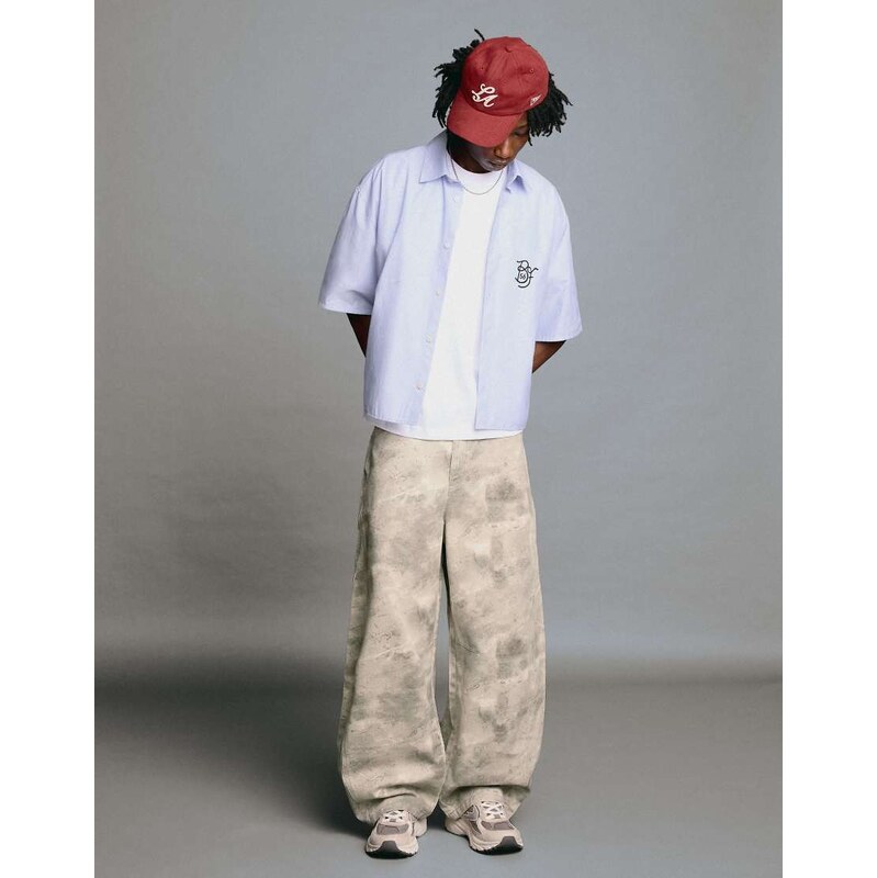 Bershka Printed barrel-leg trousers in light grey