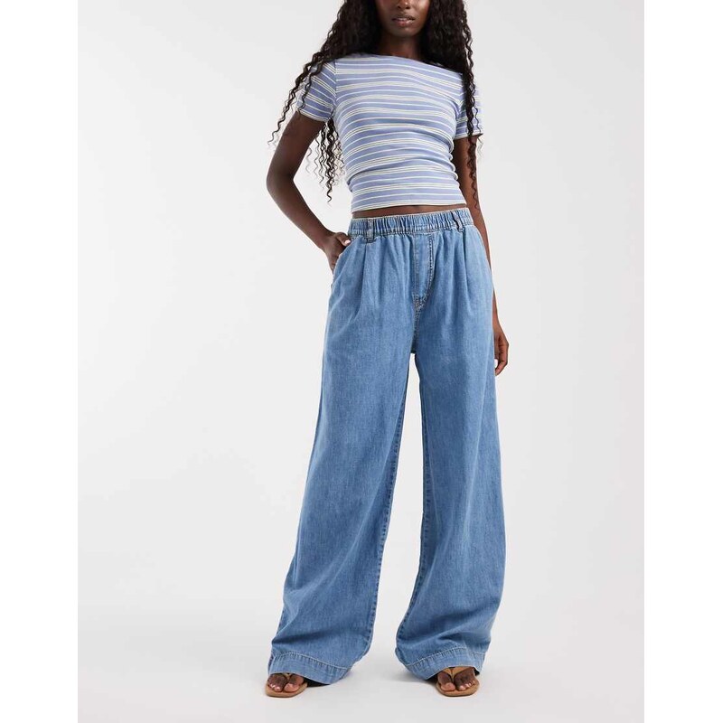ASOS DESIGN wide leg pull on jean in midwash blue