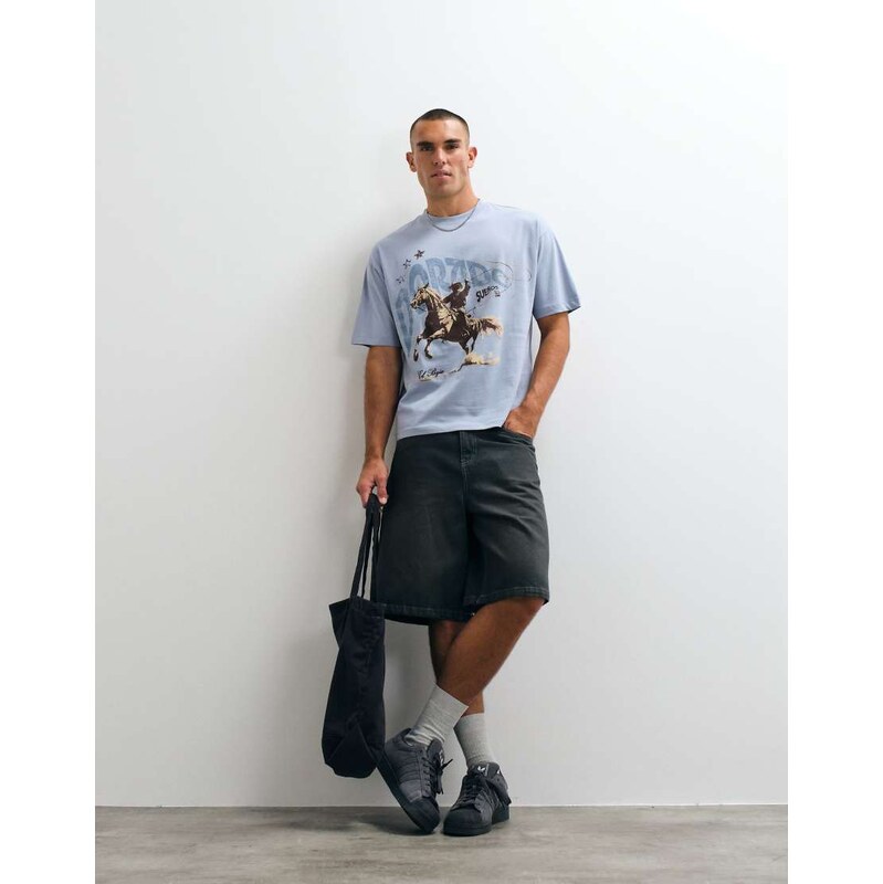 ASOS DESIGN oversized t-shirt with cowboy print in blue