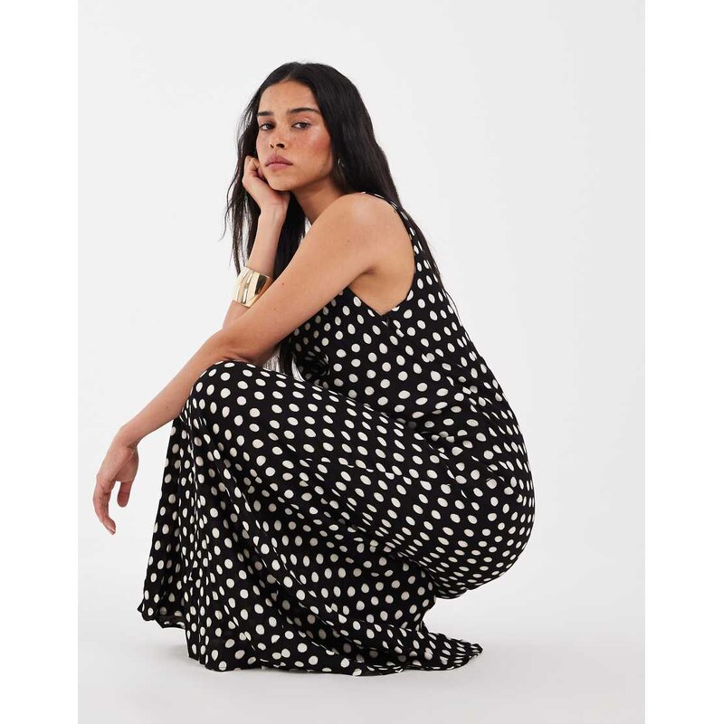 AWARE sleeveless cowl neck maxi dress in black with spot print