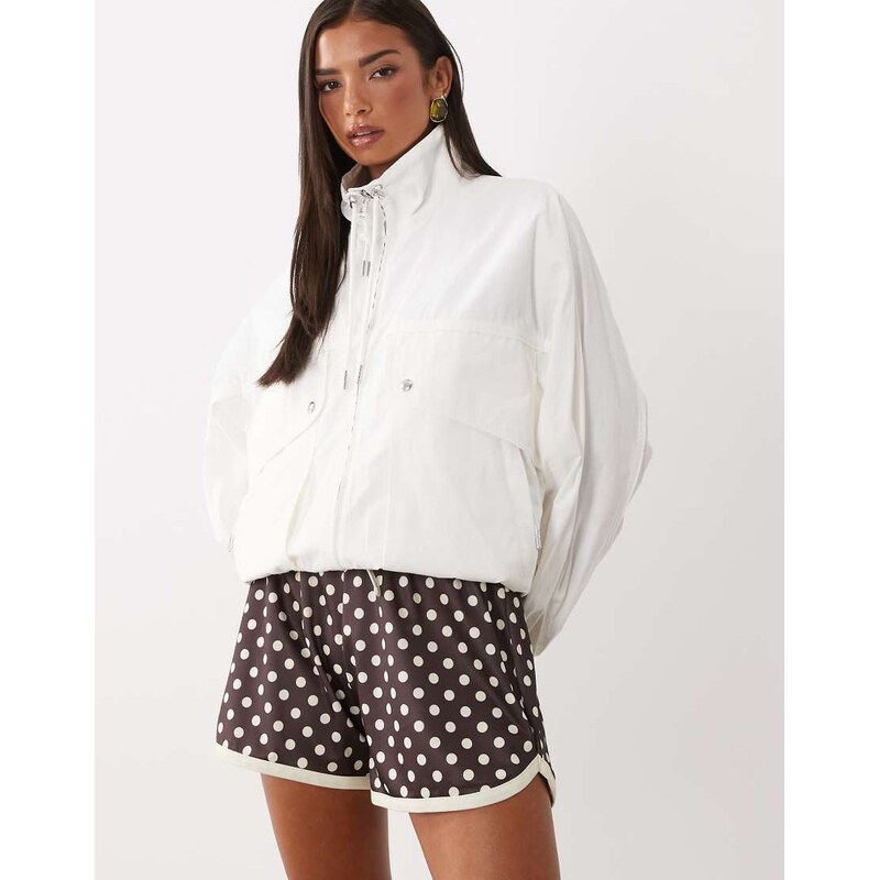 ASOS DESIGN satin polka dot mini shorts in choc and cream-Brown