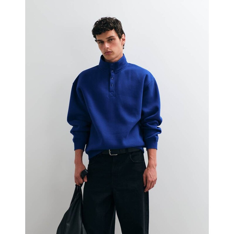 ASOS DESIGN oversized funnel neck sweatshirt with snap fasteners