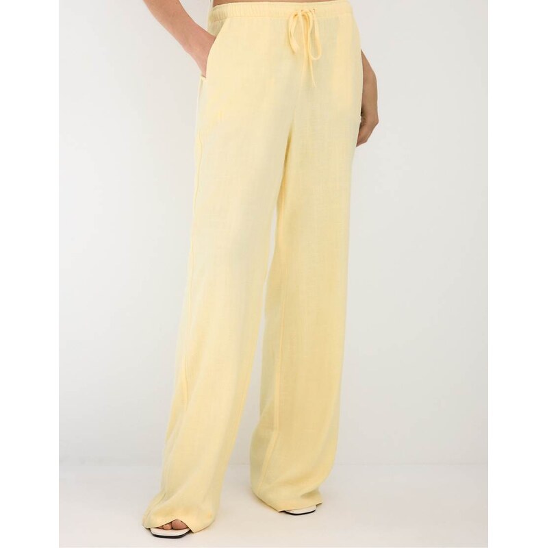 Stradivarius Flowy linen-look trousers in pastel yellow