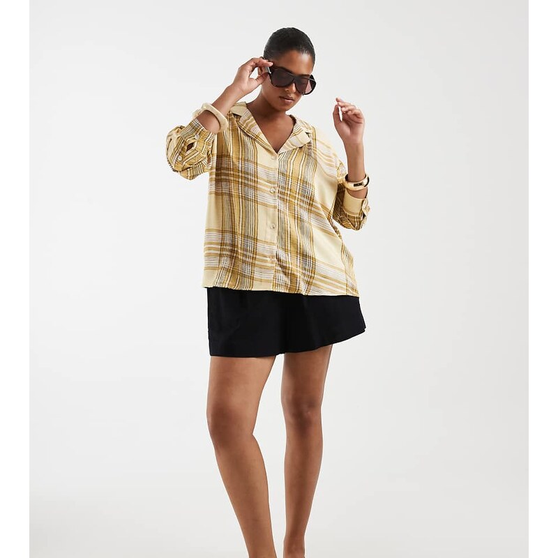 ASOS Curve ASOS DESIGN Curve satin revere collar shirt in yellow