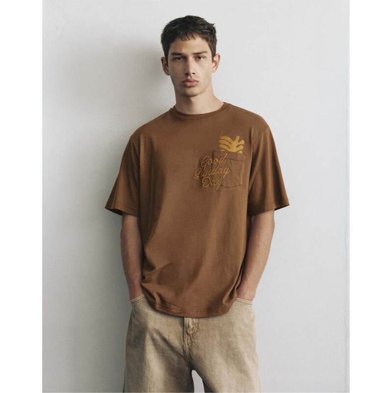 Pull&Bear Boxy-fit graphic pocket t-shirt in brown