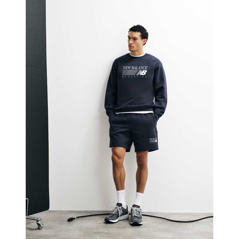 New Balance reimagined graphic fleece 7 inch shorts in black