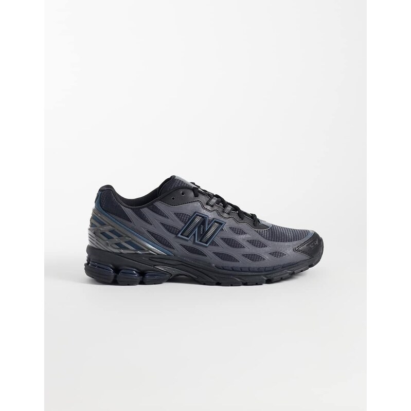 New Balance 1906 trainers in black and blue