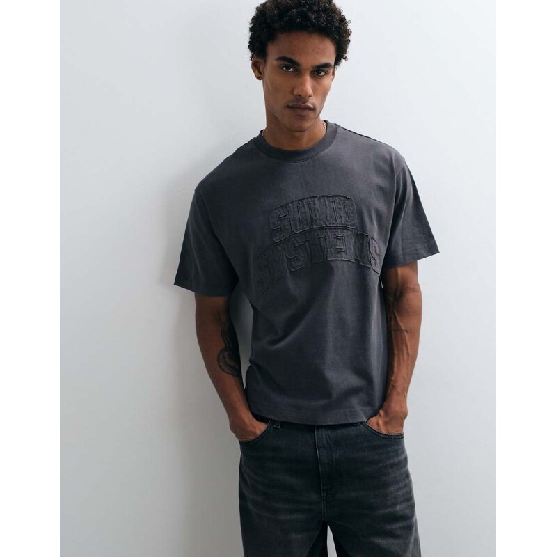 ASOS DESIGN boxy relaxed t-shirt with distressed applique in