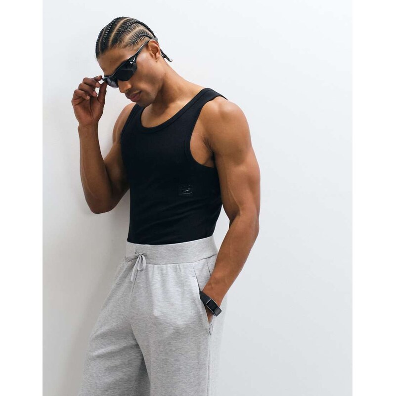 Nike Training NAC Dri-FIT ribbed tank in black