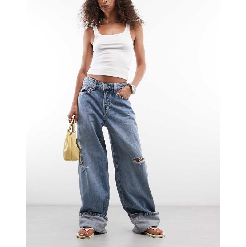Monki fold up baggy jeans with distressing in denim blue
