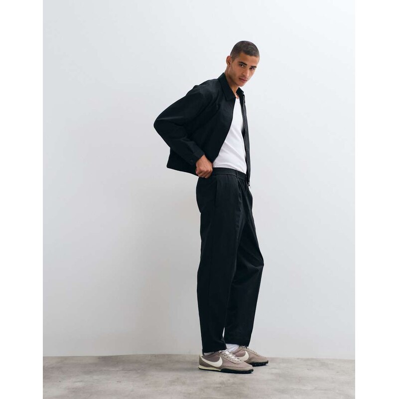 ASOS DESIGN smart co-ord carrot fit trousers in black seersucker