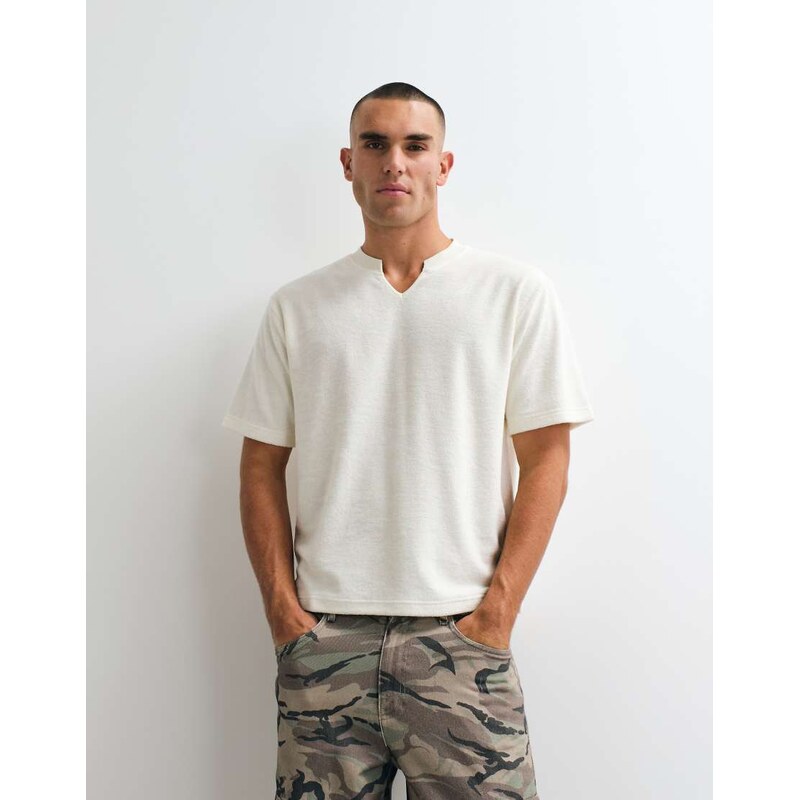 ASOS DESIGN boxy relaxed t-shirt with notch neck in cream