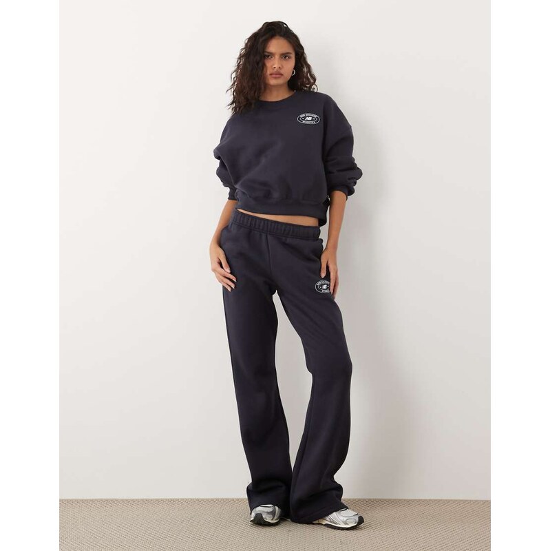 New Balance reimagined fleece track pant in black