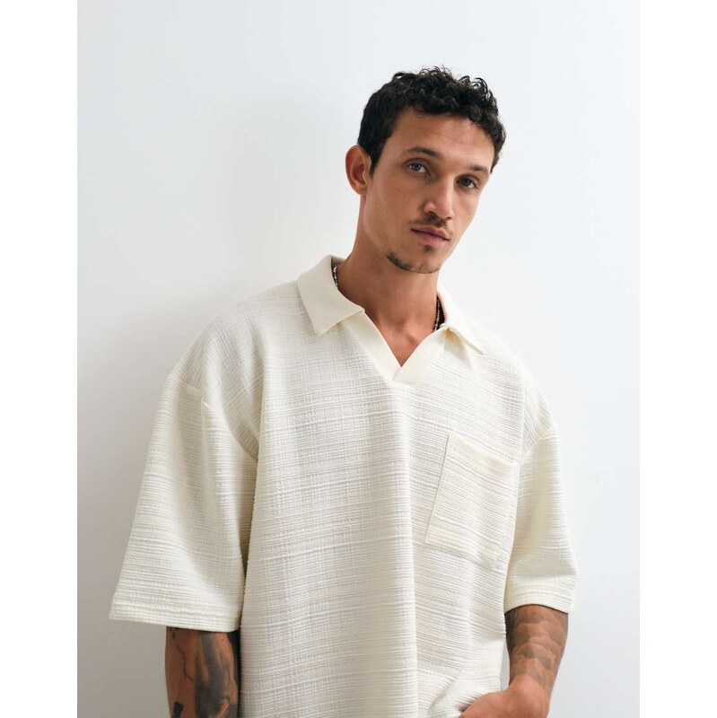 ASOS DESIGN oversized 3/4 length sleeve polo in textured fabric