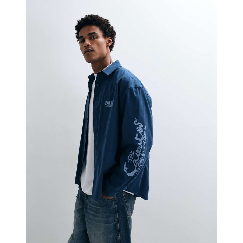 ASOS DESIGN oversized poplin shirt with placement prints in blue