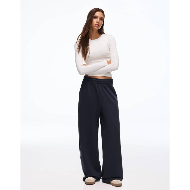 Bershka Plush jogger trousers in blue-Navy
