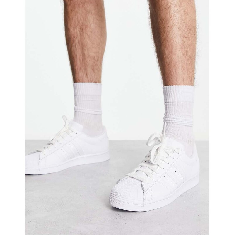 adidas Originals Superstar trainers in triple white