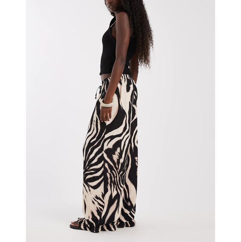 ASOS DESIGN pull on trouser with frill hem in animal print-Multi