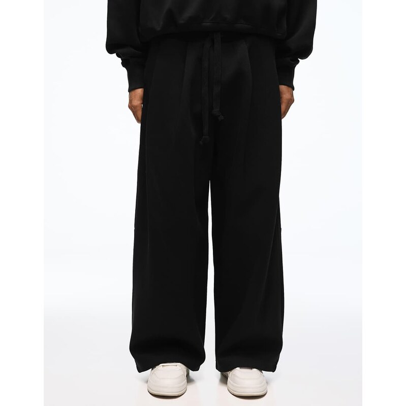 Bershka Bonded pleated volume jogger trousers in black