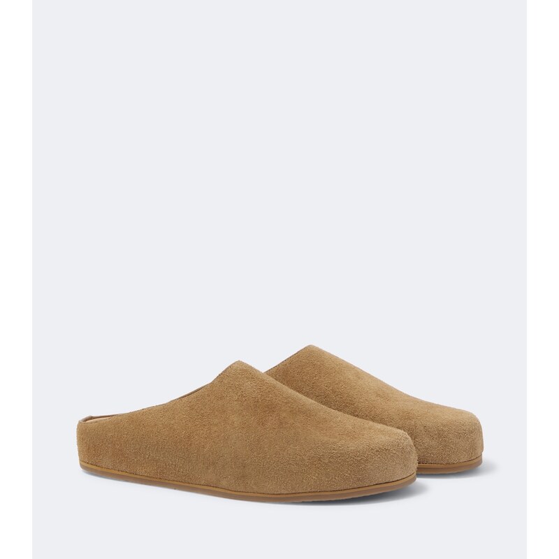 Studio Nicholson Wearing suede mules
