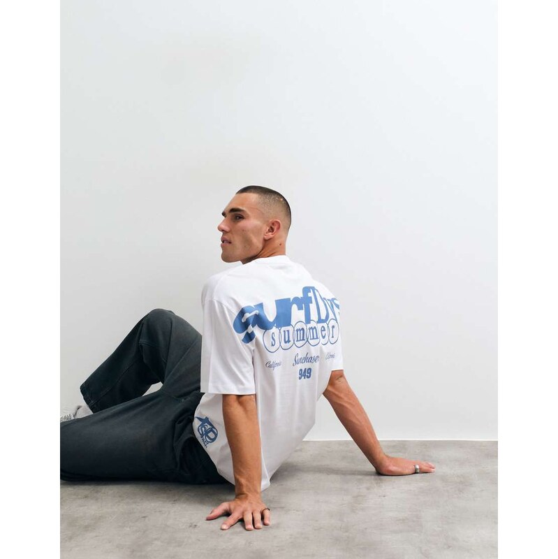 ASOS DESIGN oversized t-shirt with surf graphic in white