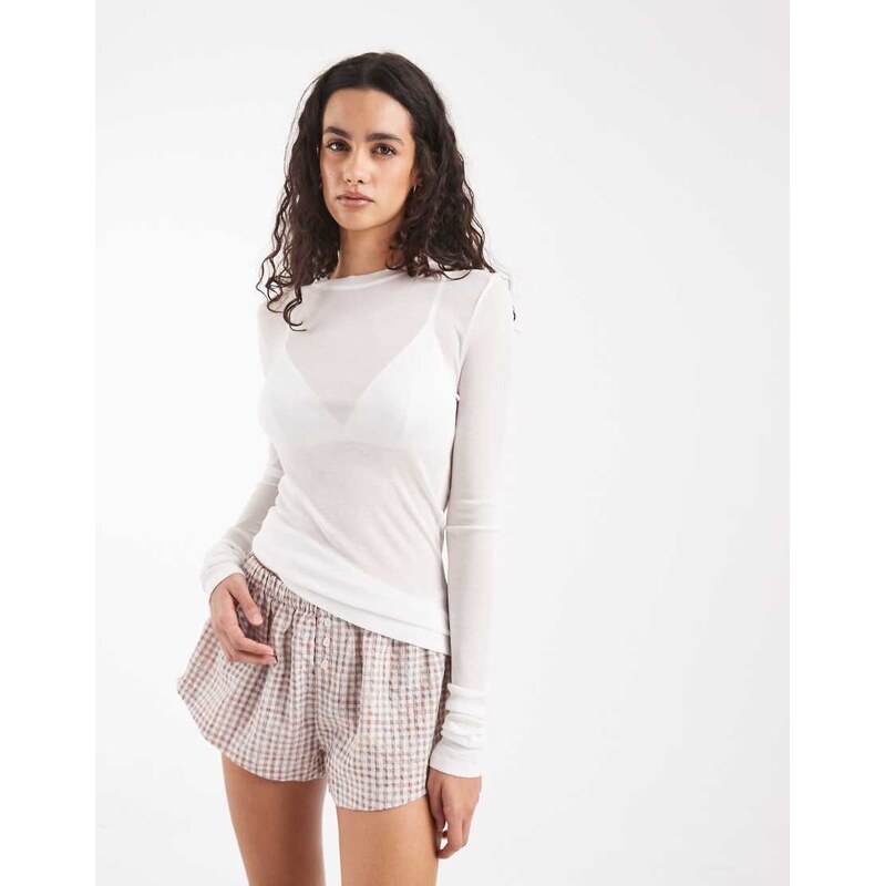 ASOS DESIGN lounge semi sheer long sleeve top in cream-White