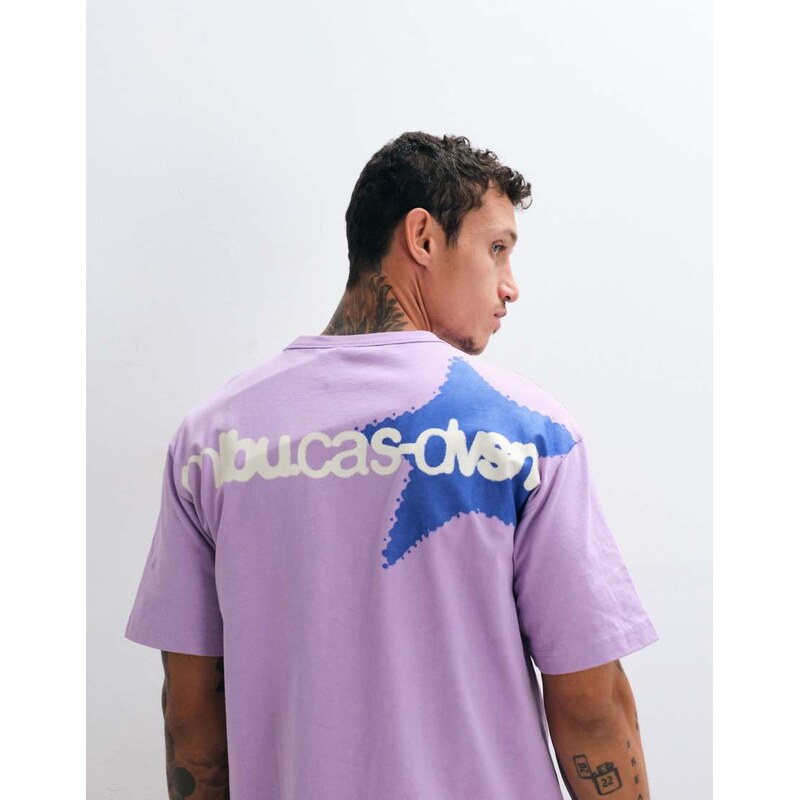 ASOS DESIGN boxy relaxed t-shirt with star graphic in lilac wash