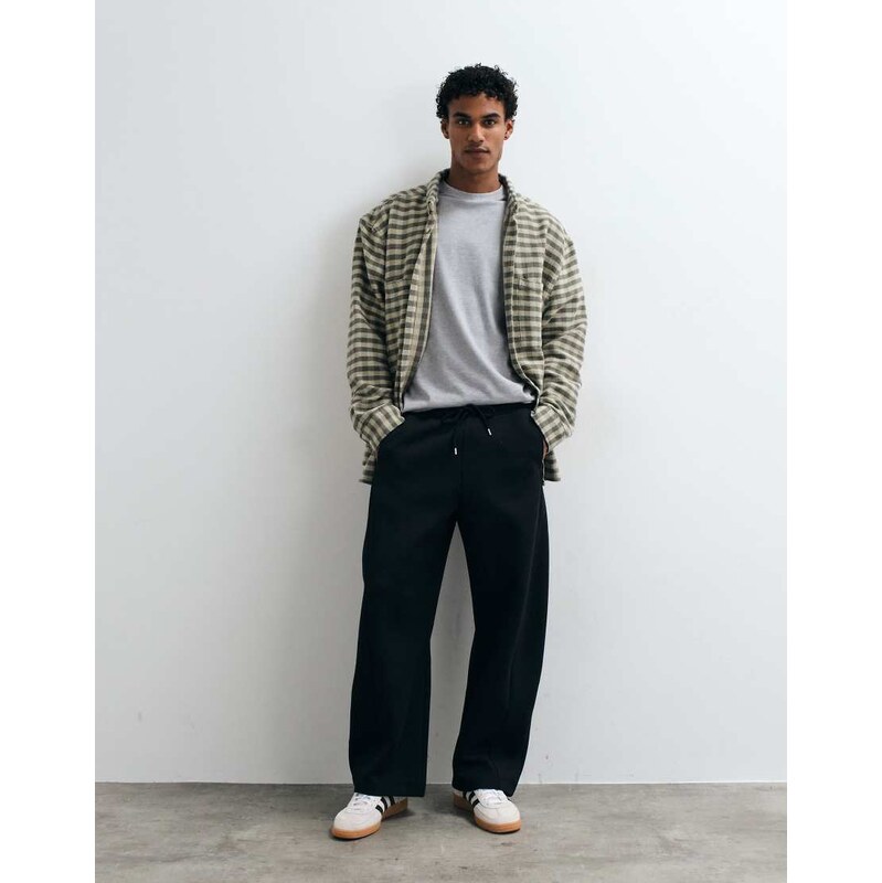ASOS DESIGN cocoon fit joggers with displaced seams in black