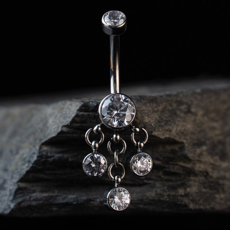 CryptoEshop Visací titanový piercing do pupíku se třemi čirými
