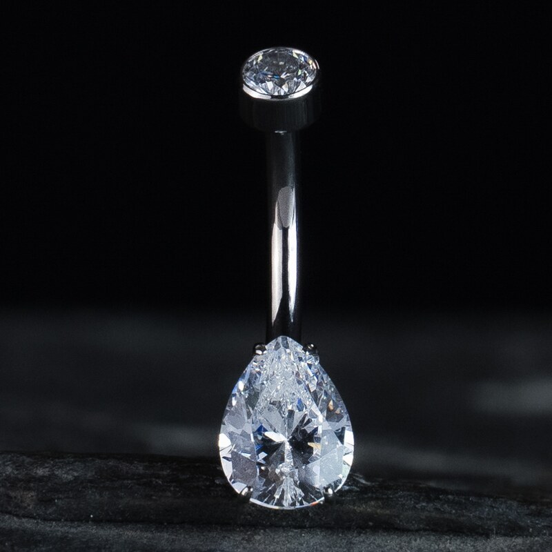 CryptoEshop Titanový piercing do pupíku Clearis s menším
