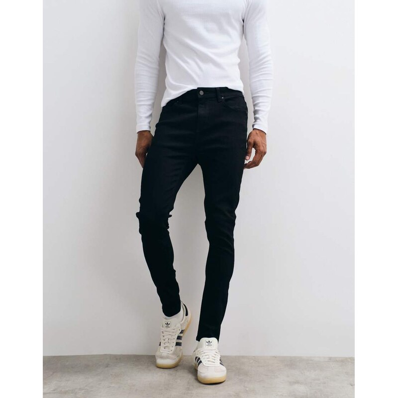 ASOS DESIGN spray on jeans with power stretch in black