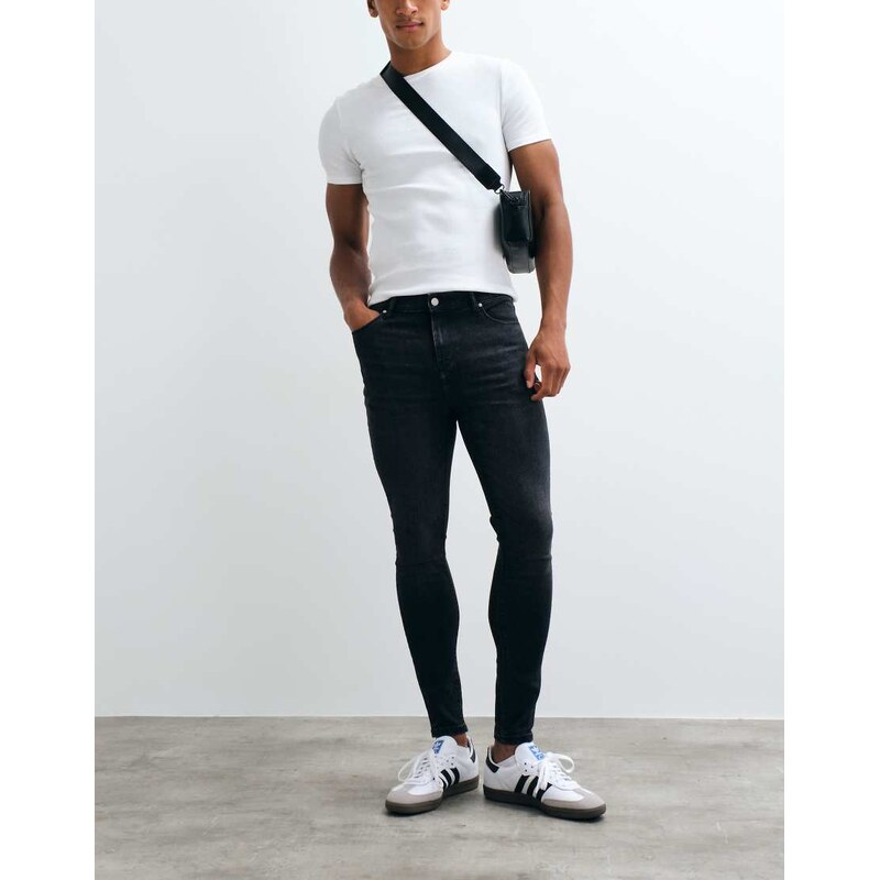 ASOS DESIGN SUPER SKINNY jeans in power stretch denim in washed