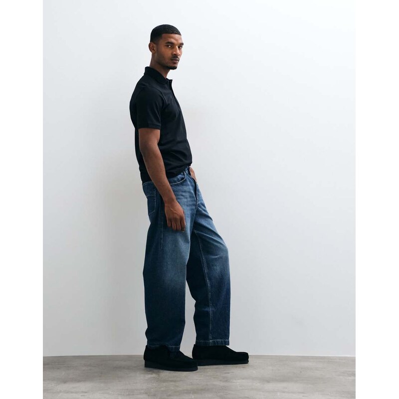 ASOS DESIGN loose straight jeans in dark wash blue with pleats