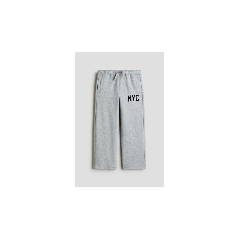 H&M - Kalhoty joggers česaným rubem a tištěným motivem. - Šedý