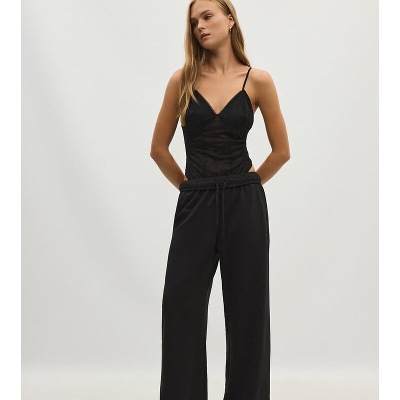 Stradivarius Petite wide-leg jogger trousers in black