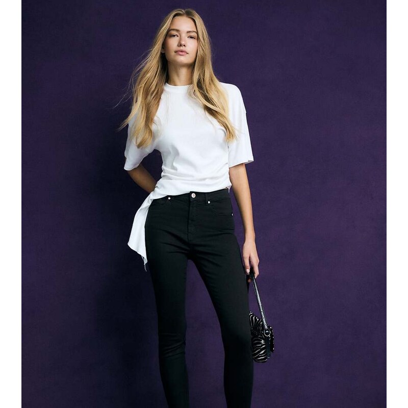 Stradivarius Petite d07 regular waist skinny jeans in black