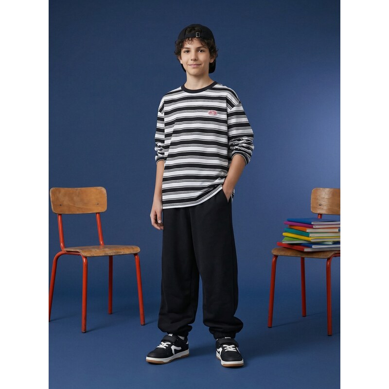 Sinsay - Baggy oversized tepláky jogger - černá