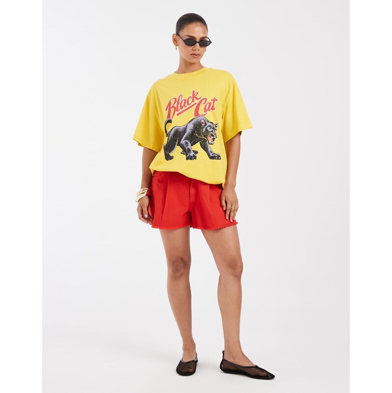 ASOS DESIGN oversized T-shirt with black cat graphic in yellow