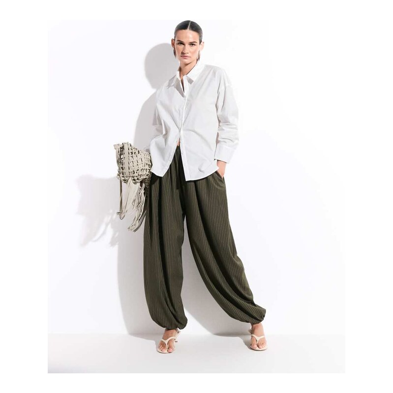 Muse Assembly balloon eva trousers in green pinstripe