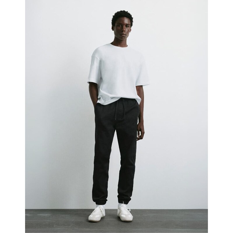 Pull&Bear Regular fit jogging trousers in black