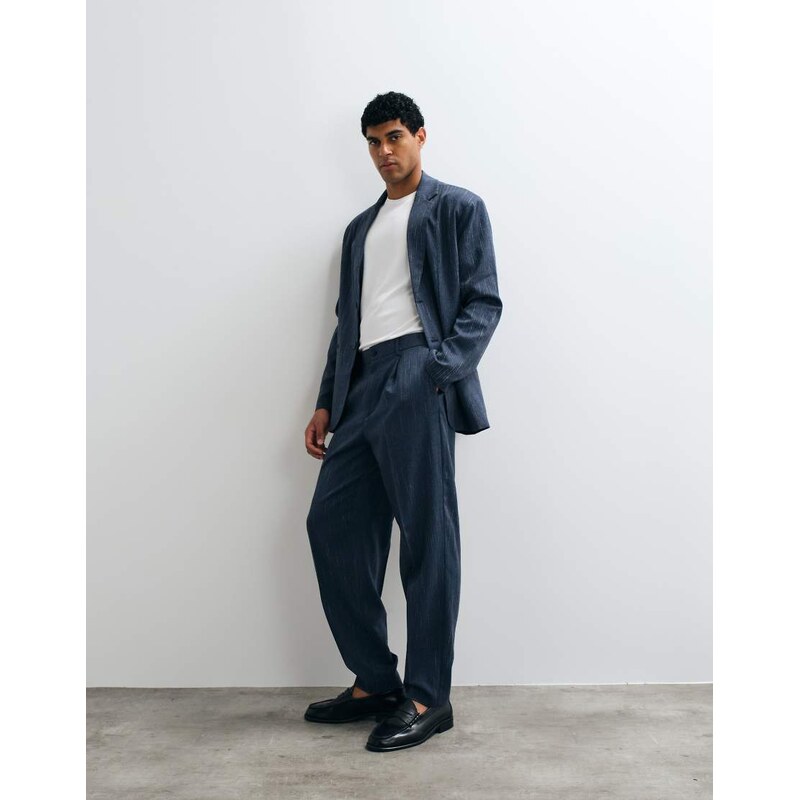 ASOS DESIGN oversized tapered denim look suit trousers with