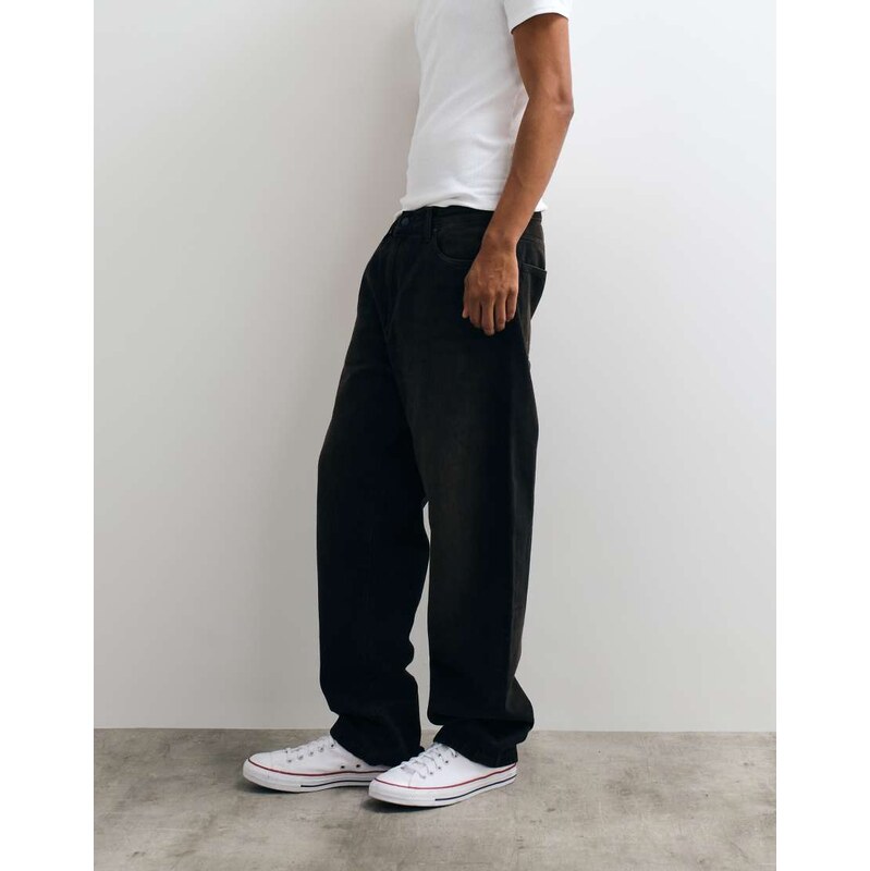 Carhartt WIP Aaron tapered regular fit jeans in dirty black wash