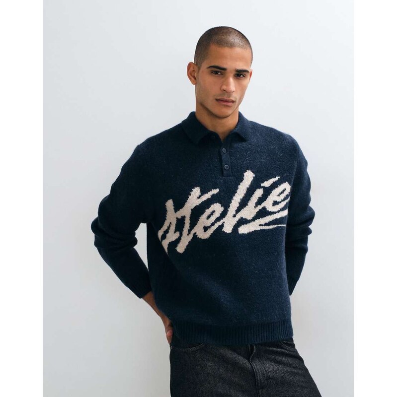 ASOS DESIGN oversized knitted polo with atelier graphic in black