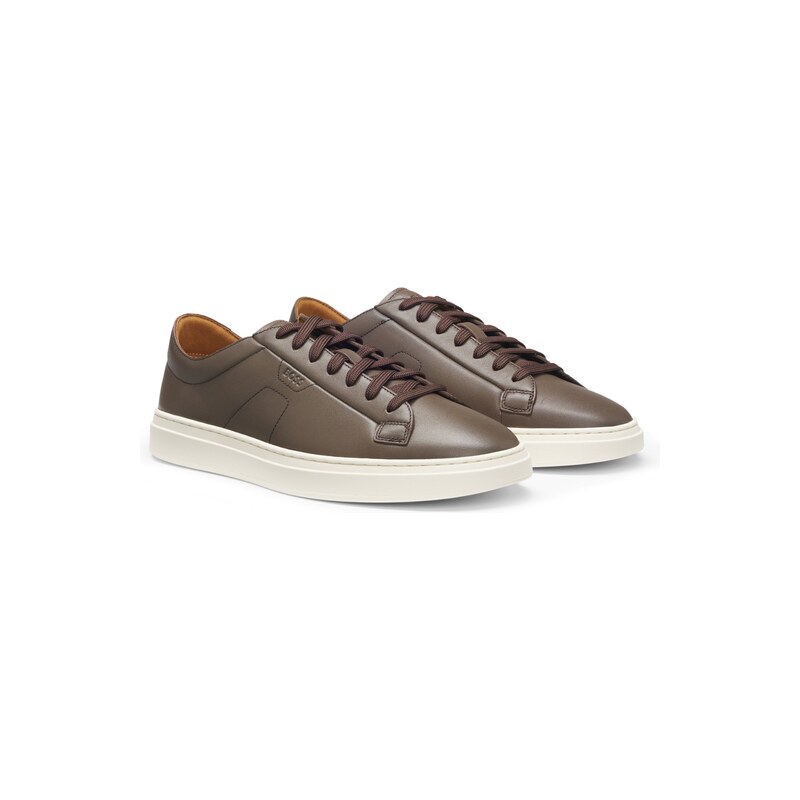 Low-top trainers in leather with embossed logo