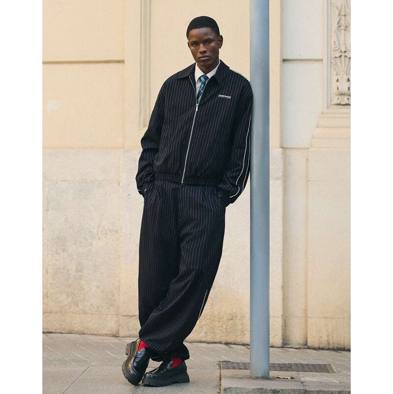 Bershka Super baggy pinstripe trousers in navy